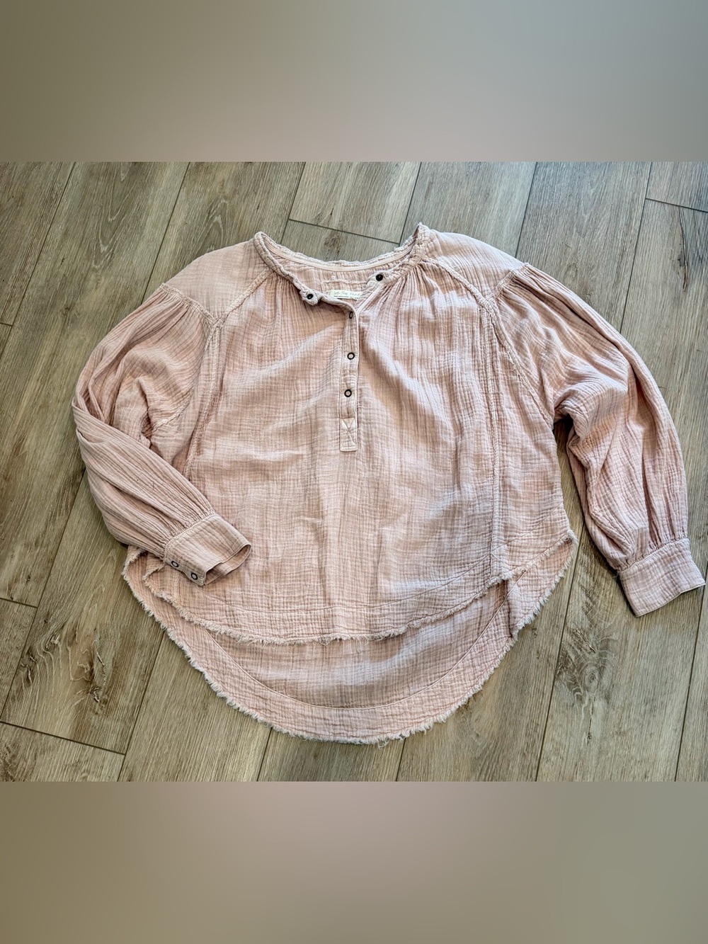 We The Free -Free People crinkled cotton gauze blouse with a frayed high-low hem